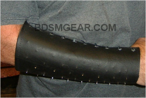 leather needle gauntlet, bdsm sensation play device